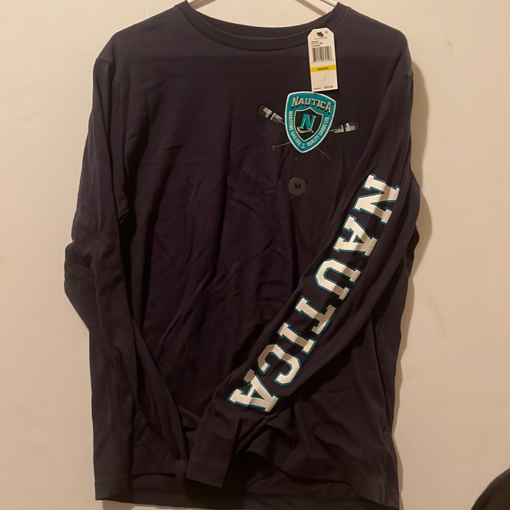 Nautica Maritime Sailing size medium . Brand new . Still has tags